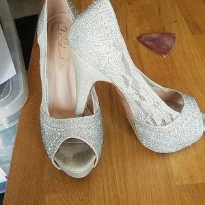 Silver rhinestone pumps